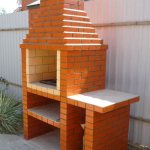 brick grill on a summer cottage
