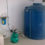 Storage tank with pump in the house