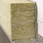 Insulating the exterior of a house with mineral wool under plaster