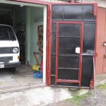 Insulated garage door leaf